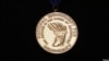 FILE - The National Endowment for Democracy's Democracy Service Medal is displayed at the Library of Congress in Washington. 