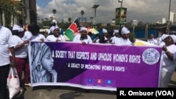 Women demonstrators, including Members of the Kenya Association of Breastfeeding Mothers, hold a protest march in Nairobi, Kenya, May 15, 2018, against a restaurant that allegedly asked a breastfeeding mother to 'Cover up or breastfeed in the toilet."