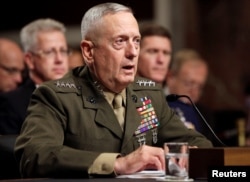 FILE - General James Mattis testifies before the Senate Armed Services Committee hearing on Capitol Hill in Washington, July 27, 2010.