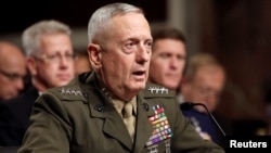 FILE - General James Mattis testifies before the Senate Armed Services Committee hearing on Capitol Hill in Washington, July 27, 2010. 