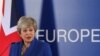 FILE - British Prime Minister Theresa May holds a news conference following an extraordinary European Union leaders summit to discuss Brexit, in Brussels, Belgium April 11, 2019. 