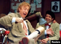 FILE - American actor Gene Wilder (L) performs alongside compatriot Rolf Saxon, during the rehearsal of a scene from Neil Simon's 'Laughter on the 23rd Floor', in New York, Oct. 2, 1996.