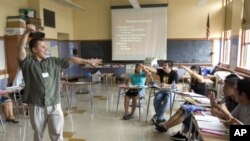 ESL (English-as-a-second-language) teacher Xavier Chavez teaches a summer history class at Benson High School in Portland, Oregon in this file photo.