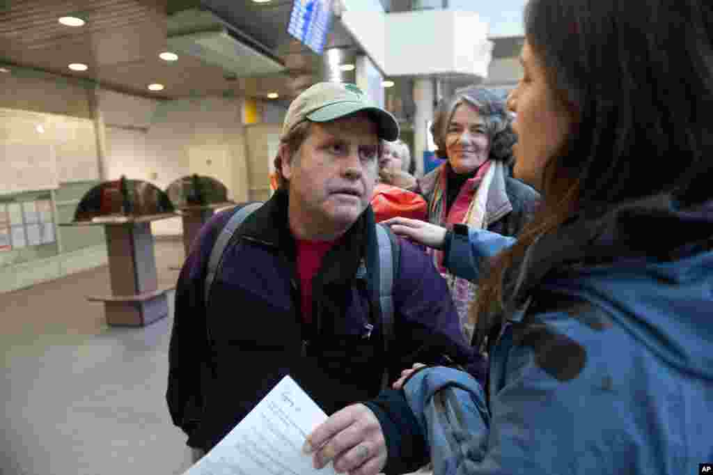 Greenpeace International activist Captain Peter Willcox of the U.S. leaves the departure lounge at St. Petersburg airport, St. Petersburg, Russia, Dec. 27, 2013.