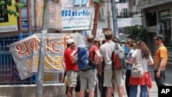 A group of young travelers on Lazimpat road in Kathmandu, 08 May 2010