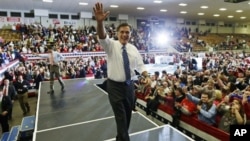 Republican presidential candidate and former Massachusetts Governor Mitt Romney and vice presidential candidate Representative Paul Ryan campaign at the Veterans Memorial Coliseum, Marion County Fairgrounds, in Marion, Ohio, October 28, 2012.