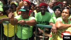 FILE: Zanu-PF supporters outside parliament during an official opening ceremony.