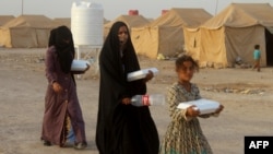 Les déplacés irakiens de Falloujah ont pris refuge dans le camp de Amiriyiah al-Fallujah, à quelque 30 km au sud de la ville assiégée, le 20 juin 2016.