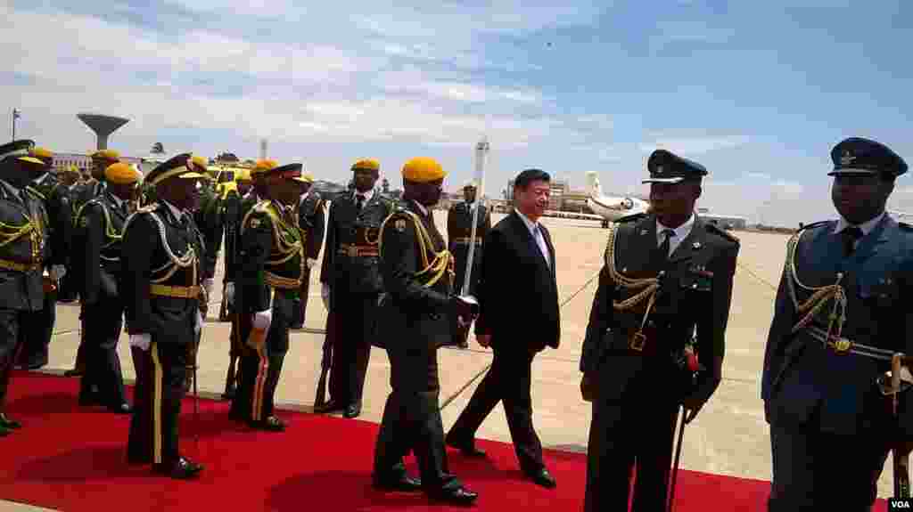 President Xi Jingping inspecting a guard of honour Tuesday at Harare International Airport. (Photo: Irwin Chifera)