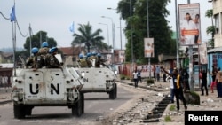FILE - United Nations peacekeepers patrol the streets of the Democratic Republic of Congo's capital Kinshasa, Dec. 20, 2016.