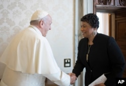 Youngest child of civil rights leaders Martin Luther King Jr. Bernice King is welcomed by Pope Francis on the occasion of their private audience, at the Vatican, March 12, 2018.