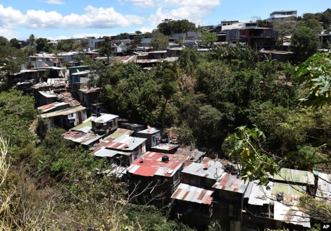 FILE - This March 29, 2019, photo shows a bird's eye view of La Carpio, a shantytown on the outskirts of San Jose, Costa Rica. The number of Nicaraguan exiles living in La Carpio has swelled since the Nicaraguan protests that began last April.