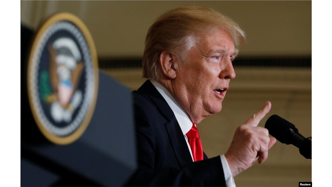 U.S. President Donald Trump addresses a joint news conference with Australian Prime Minister Malcolm Turnbull in the East Room of the White House in Washington, Feb. 23, 2018.