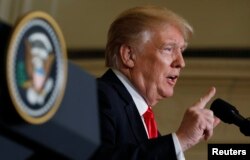 U.S. President Donald Trump addresses a joint news conference with Australian Prime Minister Malcolm Turnbull in the East Room of the White House in Washington, Feb. 23, 2018.