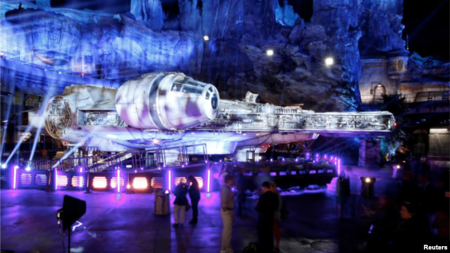 In this file photo, guests explore "Star Wars: Galaxy's Edge" near a Millennium Falcon starship at Disneyland Park in Anaheim, California, U.S., May 29, 2019. (REUTERS/Mario Anzuoni/File Photo)