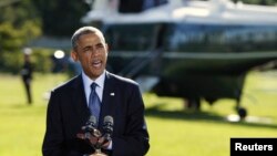 바락 오바마 미국 대통령이 23일 워싱턴 백악관에서 유엔 총회 참석 차 뉴욕으로 향하기에 앞서, 미군의 시리아 내 ISIL 공습에 관한 입장을 밝히고 있다.