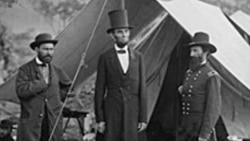 President Abraham Lincoln, center, is seen in Maryland in 1862. The Abraham Lincoln Presidential Library and Museum in Illinois is questioning whether a stovepipe hat at the museum once belonged to the former president.