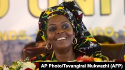 FILE - Zimbabwean first lady Grace Mugabe attends the opening session of the ZANU PF 16th Annual Peoples Conference in Masvingo, about 300 kilometres, south of the capital Harare, Dec. 16, 2016. 