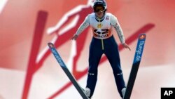 FILE - Coline Mattel of France makes her competition jump, during the Women's Normal Hill Individual event at the FIS Ski jumping Cup in Sochi, Russia.