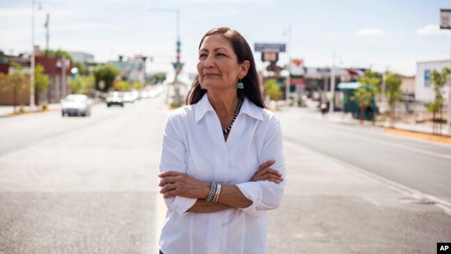 FILE - Deb Haaland poses for a portrait in a Nob Hill Neighborhood in Albuquerque, N.M., June 5, 2018. Haaland, a tribal member of Laguna Pueblo, became the first Native American woman in Congress.