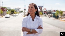Deb Haaland poses for a portrait in a Nob Hill Neighborhood in Albuquerque, N.M., June 5, 2018. Haaland, a tribal member of Laguna Pueblo, is aiming to become the first Native American woman in Congress. 