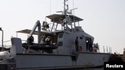 FILE - A naval boat is seen off the Atlantic coast in Nigeria's Bayelsa state December 18, 2013. Nigeria has been at the center of the high-seas piracy wave.