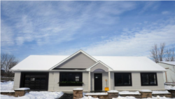 This file photo shows the outside of a 3D printed model home, built by SQ4D, in Long Island, New York, on February 11, 2021. REUTERS/Carlo Allegri