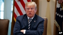President Donald Trump speaks during a cabinet meeting at the White House, May 9, 2018, in Washington.