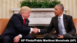 Presiden AS Barack Obama saat menerima Presiden terpilih Donald Trump di Gedung Putih, Kamis (10/11).