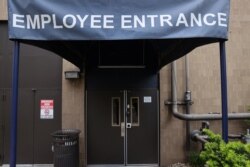 The employee entrance of a Hyatt hotel is unused while the hotel is completely closed to guests during the coronavirus disease (COVID-19) outbreak, in Washington