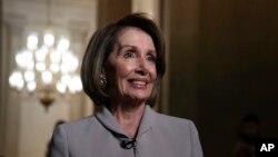 House Democratic Leader Nancy Pelosi of California, who will become speaker of the House Thursday, walks to her new office at the Capitol in Washington, Jan. 2, 2019. The Republicans will relinquish the majority to House Democrats under the leadership of Pelosi.