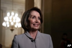 House Democratic Leader Nancy Pelosi of California, who will become speaker of the House Thursday, walks to her new office at the Capitol in Washington, Jan. 2, 2019.