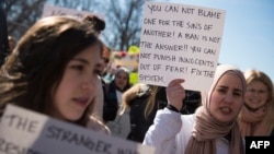 People protest against Trump travel ban outside the White House, Feb. 4, 2017.