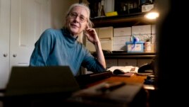 Detta Kissel, a former Treasury Department attorney, poses for a photograph at her home in Arlington, Va., Wednesday, Sept. 8, 2021. (AP Photo/Andrew Harnik)