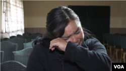 Olivia Juarez supports four children, several grandchildren and her mother by working multiple jobs. She did not tell them when she tried to 'make it' to the U.S. (R.Taylor/VOA)