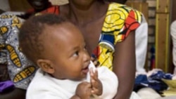 Rwandan child receiving pneumococcal vaccine, April, 2009