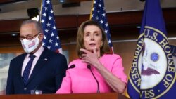 FILE - Speaker of the House Nancy Pelosi, D-Calif., joined by Senate Majority Leader Chuck Schumer, D-N.Y., speaks to reporters at the Capitol in Washington, Sept. 23, 2021,