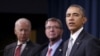 U.S. President Barack Obama delivers remarks after attending a National Security Council meeting on the counter-Islamic State campaign accompanied by U.S. Vice President Joe Biden (L) and U.S. Defense Secretary Ash Carter (C) at the Pentagon in Washington