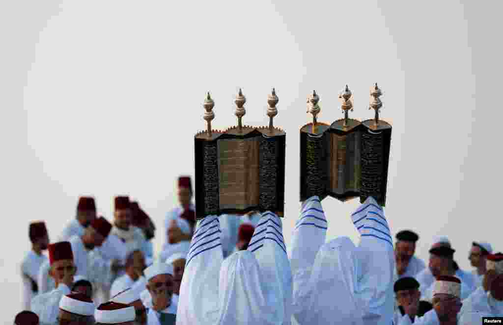 Members of the Samaritan sect take part in a traditional pilgrimage marking the holiday of Shavuot, atop Mount Gerizim near Nablus in the Israeli-occupied West Bank.