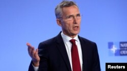 NATO Secretary-General Jens Stoltenberg holds a news conference after a meeting with the ambassadors at the Alliance headquarters in Brussels, Belgium, Nov. 26, 2018.