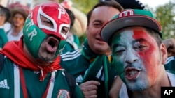 Mexico soccer fans celebrate their team victory against Germany after their group F match at the 2018 soccer World Cup in the Luzhniki Stadium in Moscow, Russia, Sunday, June 17, 2018. 