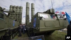 FILE - Russian air defense missile systems are displayed at the MAKS Air Show in Zhukovsky, outside Moscow, Aug. 27, 2013.