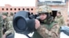 Український військовий цілиться зброєю NLAW (Next Generation Light Anti-Tank Weapon/Легка протитанкова зброя нового покоління), яку надала Україні Великобританія. 27 січня 2022 рік 