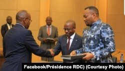 Bakambi ya General Electric Company ya Etats-Unis (G) na ba ministres ya ekolo Congo démocratique na botiyami manzaka na boyokani na Kinshasa, 13 février 2020. (Facebook/Présidence RDC)