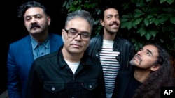 Members of the Mexican rock band Cafe Tacvba, from left, Enrique "Quique" Rangel, Jose Alfredo "Joselo" Rangel, Emmanuel "Meme" del Real and Ruben Isaac Albarran pose for a portrait in Buenos Aires, Argentina, April 28, 2017.