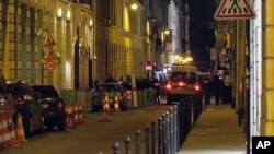 In this image made from video, French police attend the scene outside the Ritz Hotel in Paris, after a robbery Jan. 10, 2018. 