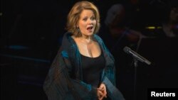 FILE - Singer Renee Fleming performs on stage during "An Evening of Serious Fun Celebrating the Legacy of Paul Newman" in New York, March 2, 2015.