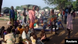 FILE - Displaced South Sudanese families are seen in a camp for internally displaced people in the United Nations Mission in South Sudan (UNMISS) compound in Tomping, Juba, South Sudan, July 11, 2016.