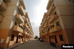 FILE - A general view of the Dinesh Nagar housing complex is pictured at Ghaziabad on the outskirts of New Delhi, April 23, 2014.