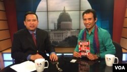 Mr. Arn Chorn-Pond, founder of Cambodian Living Arts, gives during an interview with Sok Khemara at a VOA studio in Washington, D.C on Monday, April 27, 2015. Cambodian Living Arts helps to preserve the Cambodian cultures and arts through trainings, perfo
